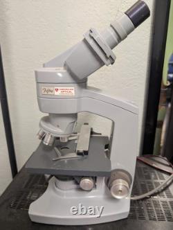 American Optical Fifty Phase Microscope with Binocular Head + 4 Objective Lenses