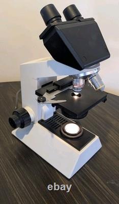 Olympus CH20 Microscope With 4 Objectives