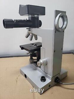 Microscope binoculaire Leitz Wetzlar 020-441.004 SM-LUX avec 4 objectifs