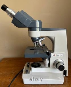 Microscope pédagogique AO American Optical One-Ten Illuminator 1130 avec 3 objectifs